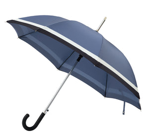 Alex umbrella comes with black leather handel. A dapper premium umbrella with pattern in blue, white and black. Double layer canopy extends the life of the umbrella fiberglass ribs and sturdy frames makes the umbrella wind and gust-resistant. No matter the forecast, the Alex umbrella will protect your style. | Harry Rain 
